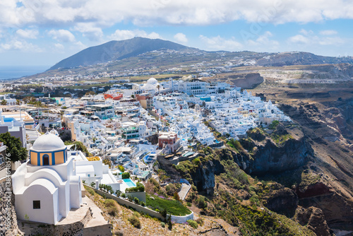 Obraz na płótnie White architecture in Santorini island, Greece. Panoramic view of Fira town at sunny day. w salonie