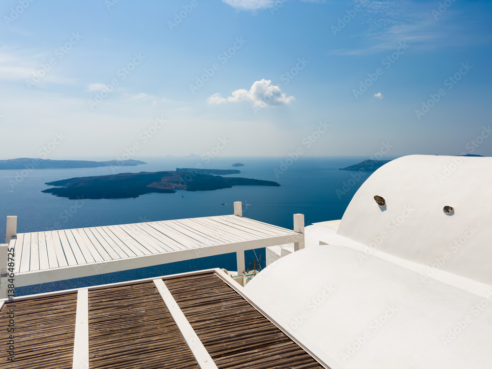 White architecture in Santorini island, Greece. Blue sea and the blue sky at sunny day.