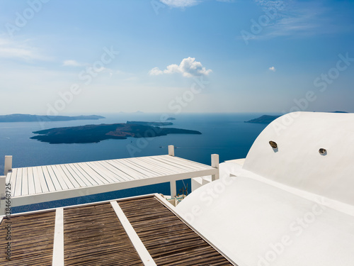 Obraz na płótnie White architecture in Santorini island, Greece. Blue sea and the blue sky at sunny day. w salonie