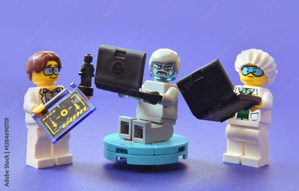 Obraz premium Editorial illustrative image of lego minifigure of modern and newer artificial intelligence AI creature with team of programmers.