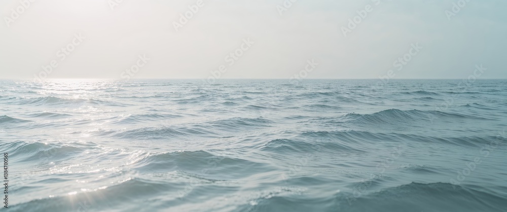 Fototapeta premium Open Ocean Scene with Rippling Water Surface and Hazy Horizon.