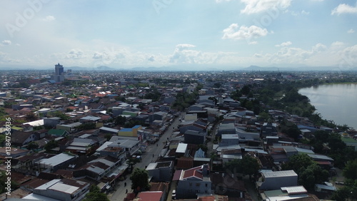 Aerial view of the city with many buildings and housing