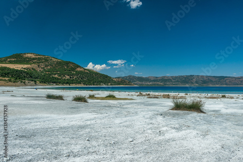 Fototapeta Naklejka Na Ścianę i Meble -  Salda Lake, Burdur, Turkey. View of Salda Lake under the blue sky with white sand and clear water. Turquoise lansdscape