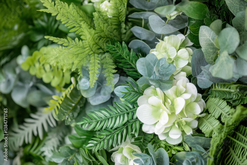 Lush green foliage and delicate white flowers creating a vibrant natural backdrop