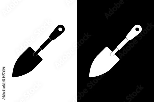 A set of gardening tools including a shovel, trowel, and spade with wooden handles and metal parts isolated on a white background