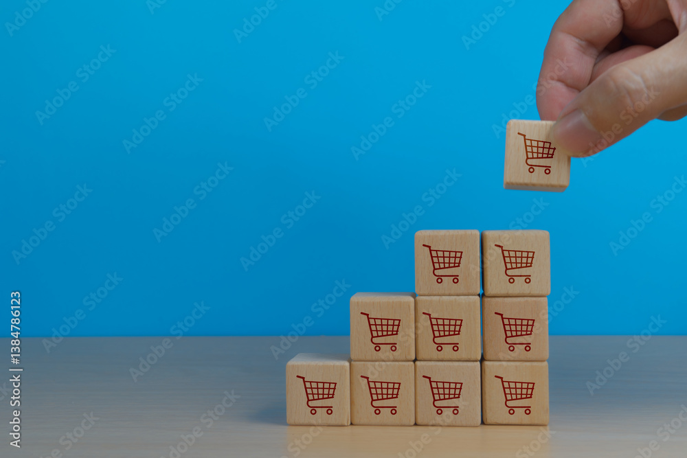 Fototapeta premium Businessman placing shopping carts on their growing sales