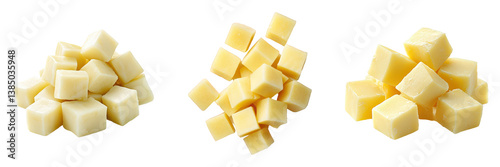 Three variations of cubed creamy yellow cheese.