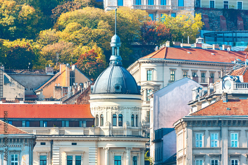 Obraz na płótnie Budapest urban landscape, with buildings of varying heights and architectural details. Look at the architectural dome of the building in Budapest w salonie