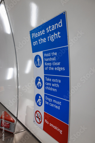 Please stand on the right safety instructions sign in London Tube station