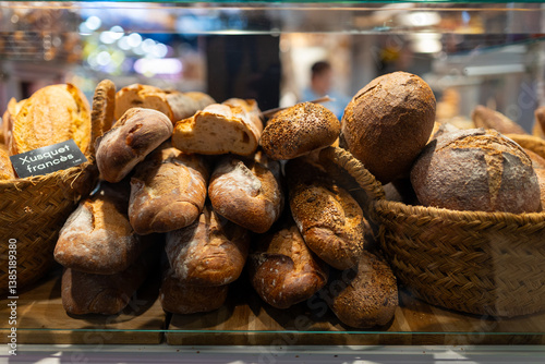 Assorted bread arranged on tray selling at bakery shop. Morning breakfast with fresh breads