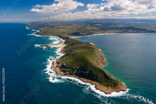 Aerial view Robberg Peninsula, remote, sandy beaches and Indian Ocean. Robberg Nature Reserve, Plettenberg Bay, Garden Route, Western Cape, South Africa. photo