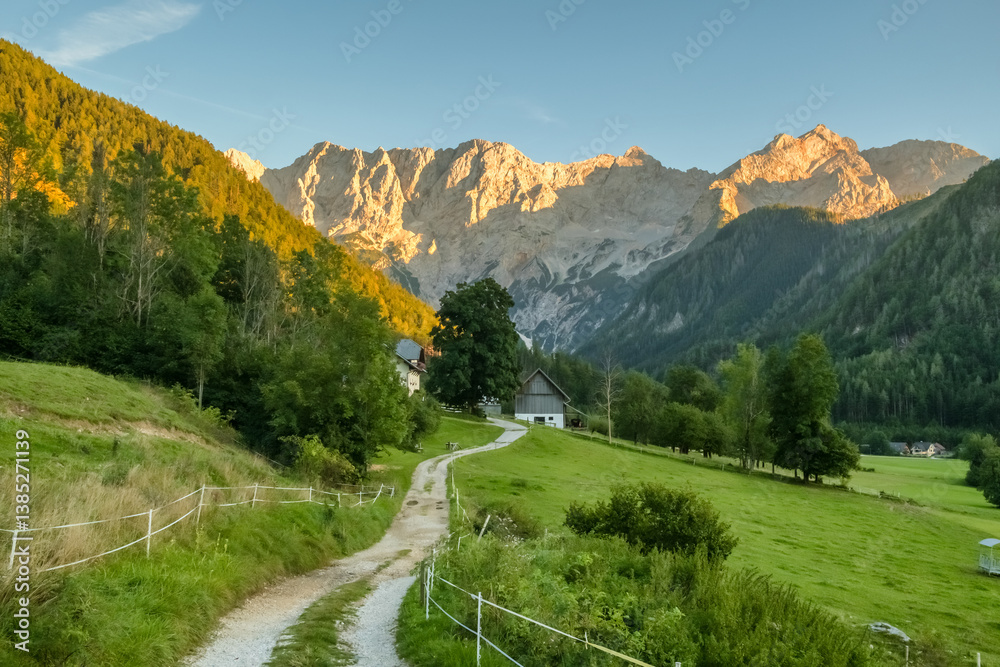 Summer Alpine landscape of the Ravenska Kocna Valley in Zgornje Jezersko at sunset, Slovenia.
