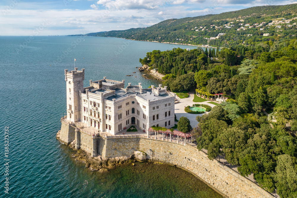 Aerial view of the Miramare Castle at the Adriatic sea coast in Italy