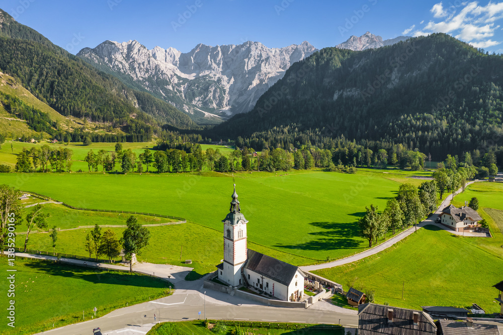 Idyllic Alpine landscape with a church in Zgornje Jezersko, Slovenia