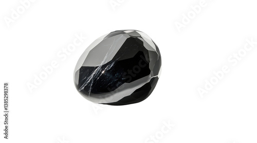 A clear, detailed shot of a black spinel stone, , with natural light reflecting off its smooth surface.