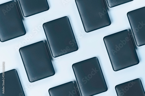 External hard drives on blue background.