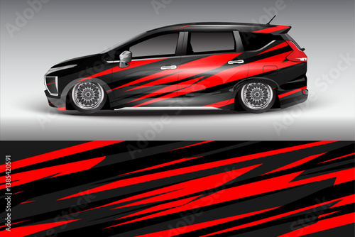 Sleek black and red modified car with stylish alloy wheels parked against a gradient background