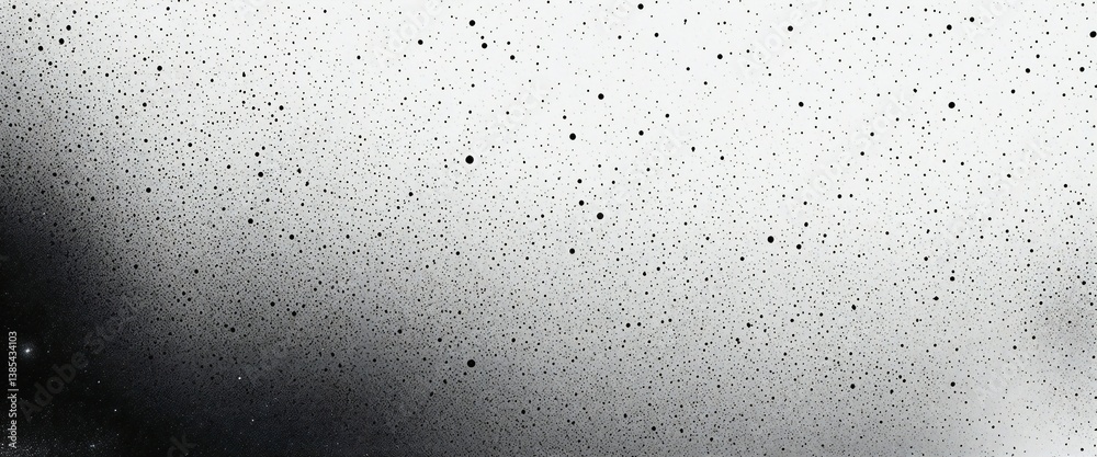 Obraz premium Gradient background transitions from dark gray to light gray, covered with randomly distributed black speckles of varying sizes in an abstract design.
