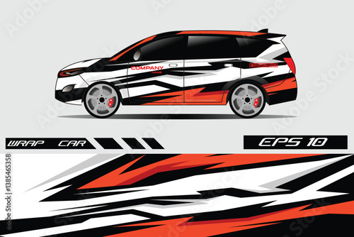 Stylishly Wrapped Car with Dynamic Graphics Displayed Against a Simple Background