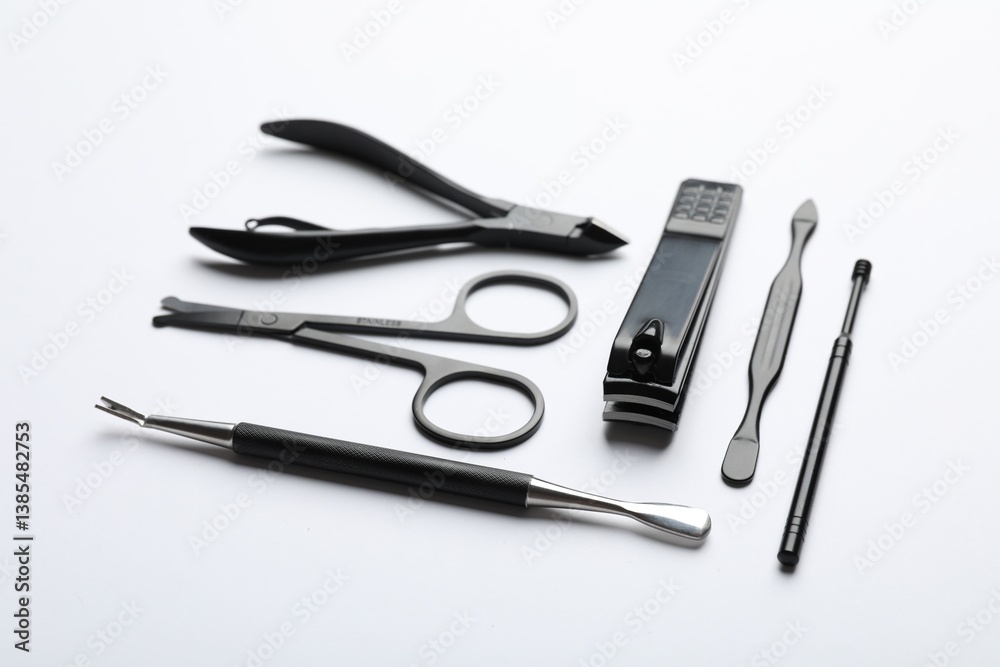 Set of different manicure tools on white background, closeup Set of different manicure tools on white background, closeup