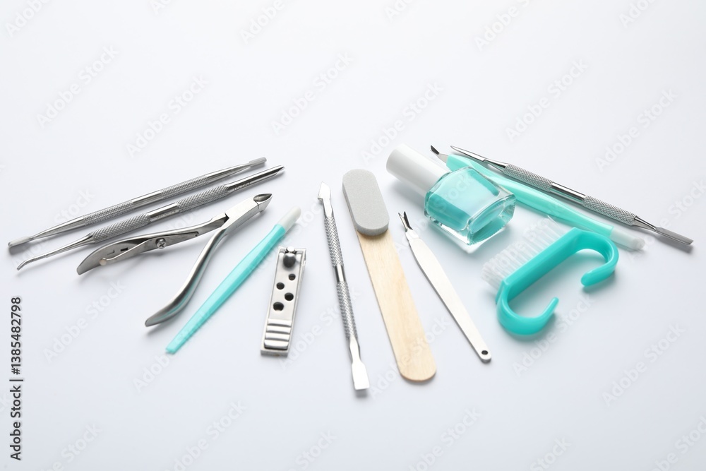 Set of different manicure tools on white background, closeup Set of different manicure tools on white background, closeup