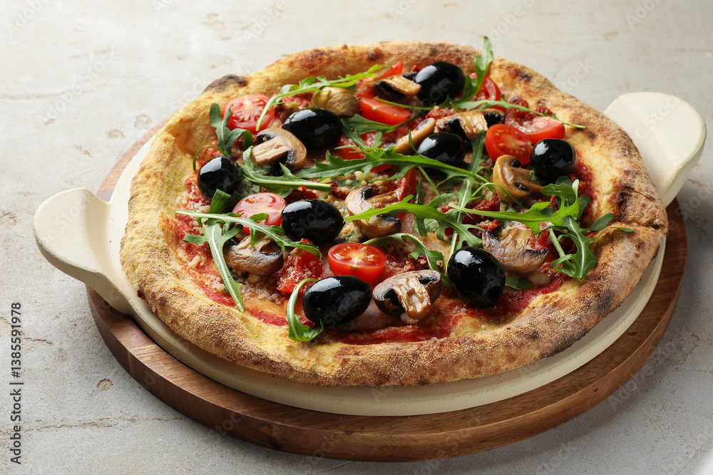 Tasty pizza with mushrooms, black olives and arugula on light grey table, closeup