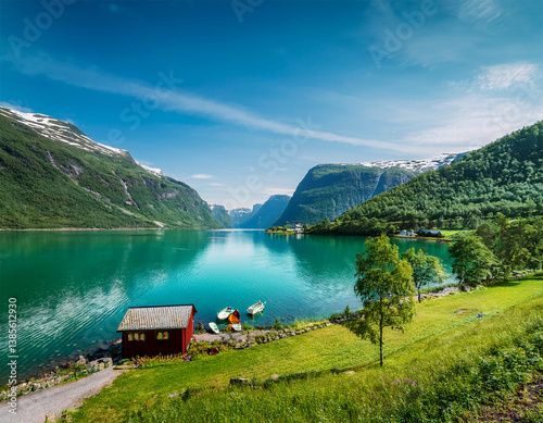norwegian landscape with green lake oldevatnet in oldedalen valley camping in olden by lake oldevatnet norway photo