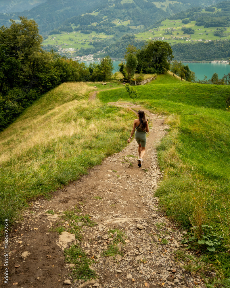 Young , beautiful caucasian woman hiking in Switzerland mountains, Young , beautiful caucasian woman hiking in Switzerland mountains,