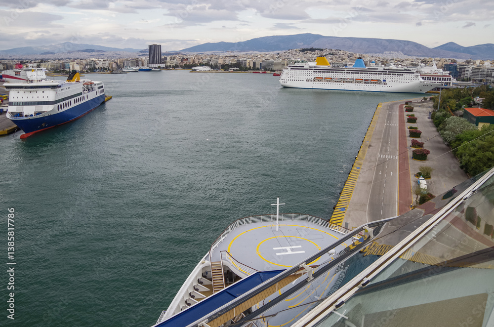 Classic cruiseship or cruise ship liner Neo Riviera in Piraeus Athens, Greece port on sunny day blue sky during Mediterranean Aegean Greek islands summer cruising dream vacation