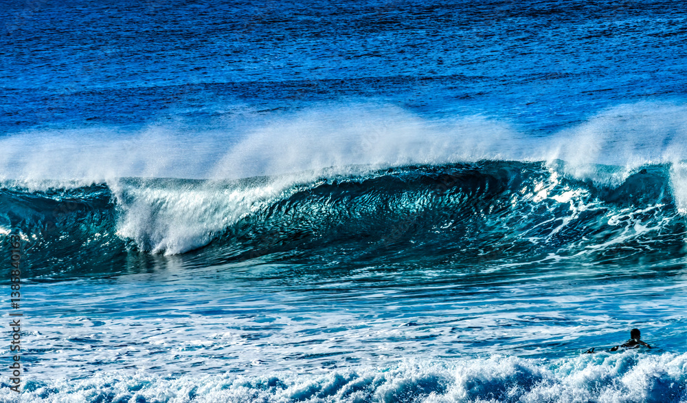 Colorful Surfer Paddling Out Wave Banzai Pipeline Oahu Hawaii