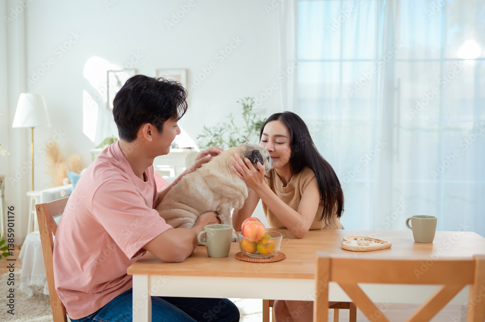 Couple Enjoys Breakfast at Home With Their Pug in a Bright, Cozy Dining Space Couple Enjoys Breakfast at Home With Their Pug in a Bright, Cozy Dining Space