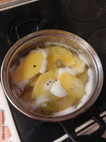 Soup with potatoes is cooked in the castrule