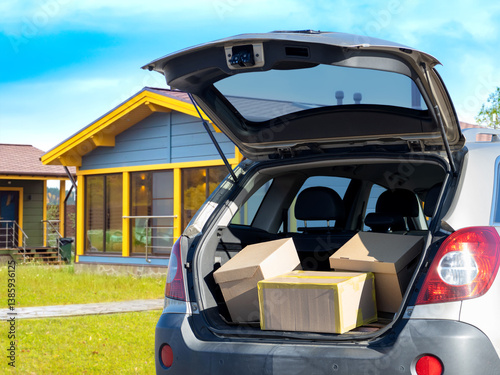 Cardboard boxes in trunk of...