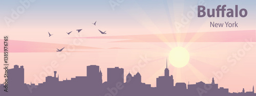 The silhouette of the city of Buffalo, New York  against the backdrop of the sunset and pink clouds. It is also made in pastel colors