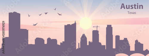 The silhouette of the city of Austin, Texas against the backdrop of the sunset and pink clouds. It is also made in pastel colors