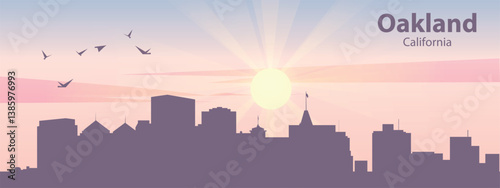 The silhouette of the city of Oakland, California against the backdrop of the sunset and pink clouds. It is also made in pastel colors