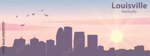 The silhouette of the city of Louisville, Kentucky against the backdrop of the sunset and pink clouds. It is also made in pastel colors