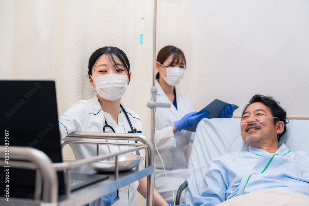 Obraz premium 入院患者のケアをするスタッフ