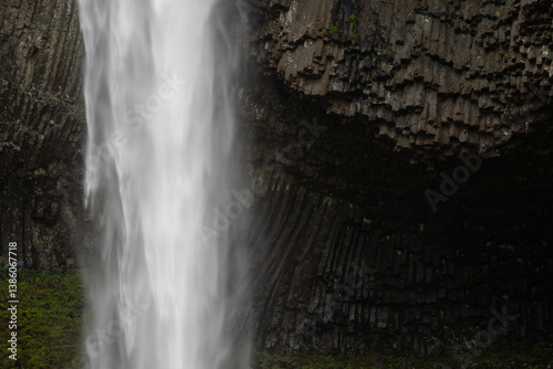 Watefall in the Columbia River Gorge with Basalt Cliffs in the backdrop