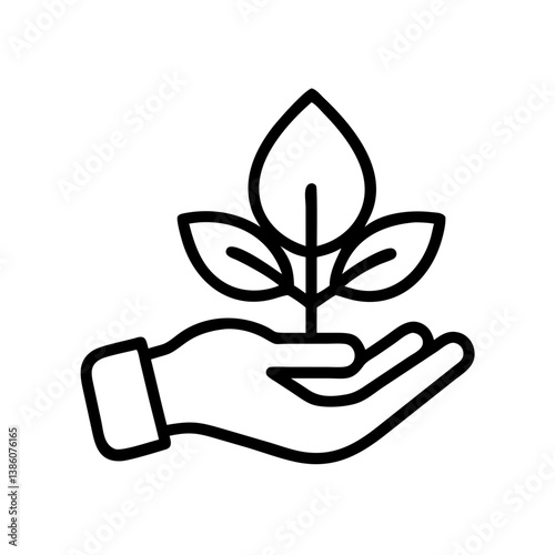 Hand holding a green plant symbolizing sustainability  