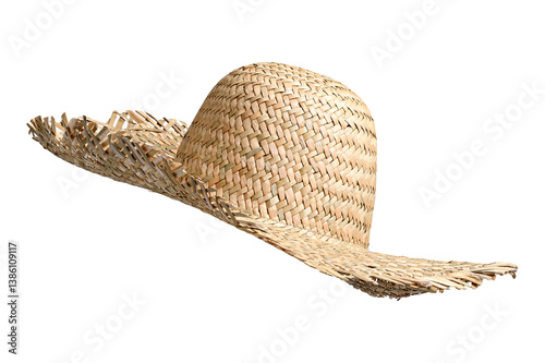 Straw beach hat side view isolated on white background. Beach hat with clipping path as design element banner, studio shot with sunlight. Summer travel cap for beach holidays on Vacation