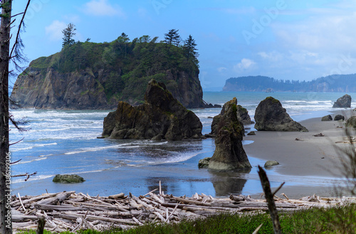 The coast of the Pacific Ocean, large cliffs and islands near the shore, Olympic NP, Washington, USA.