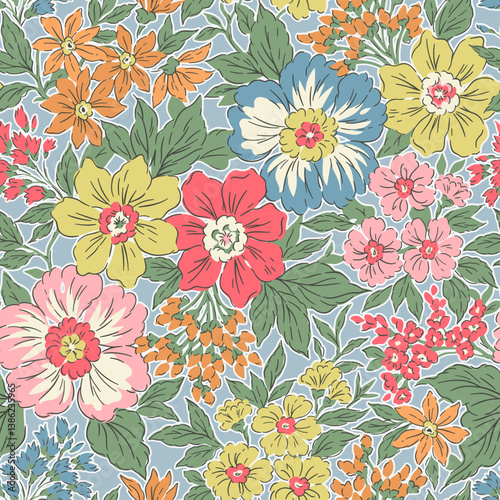 Vintage seamless floral pattern. Liberty style background of small pastel colorful flowers. Small flowers scattered over a blue background. Stock vector for printing on surfaces. Realistic flowers.