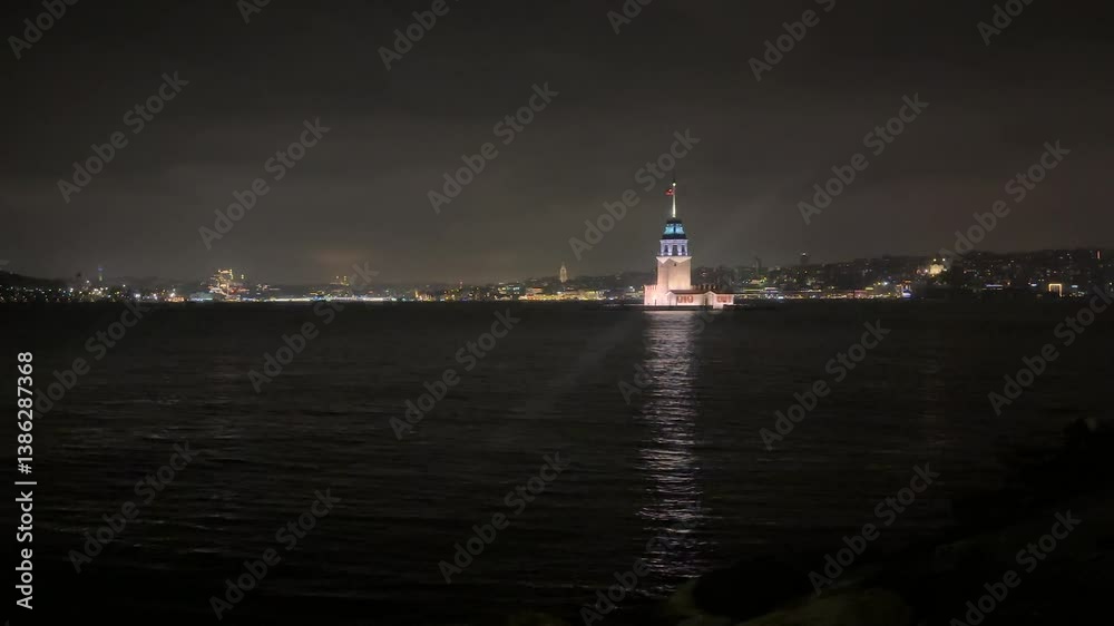 A video of the historical Maiden's Tower in Istanbul taken at night. summer. No people.