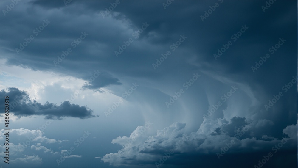 Dark storm clouds loom ominously swirling with deep gray tones in a dramatic display of approaching inclement weather Dark storm clouds loom ominously swirling with deep gray tones in a dramatic display of approaching inclement weather