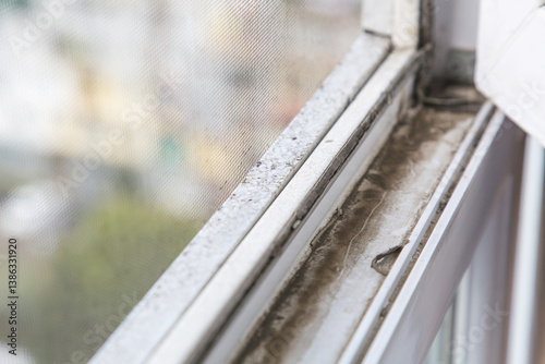 Canvastavla Heavily dust-covered plastic window frame and sill with dirt buildup and stains,