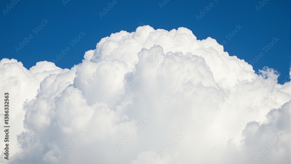 Fluffy white clouds against a deep blue sky create a light and airy natural background Perfect for adding a serene touch to any project Fluffy white clouds against a deep blue sky create a light and airy natural background Perfect for adding a serene touch to any project