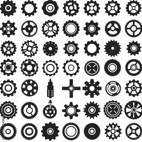 Mechanical Harmony: A meticulously curated collection of gears and cogs, a black and white study of mechanical ingenuity and precision, evoking a sense of industry, technology, and design.