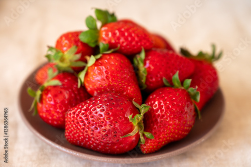 New harvest, plate with bio ripe red sweet strawberry from Tenerife, Canary islands, Spain, vegetarian food local grown fruits