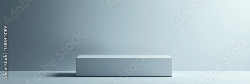 A minimalist, empty white showcase platform against a soft gray backdrop, ideal for displaying products or art pieces, creating a serene and modern atmosphere